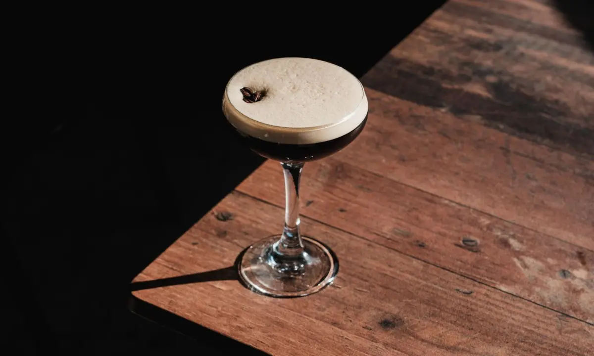 Espresso martini on a wooden bar